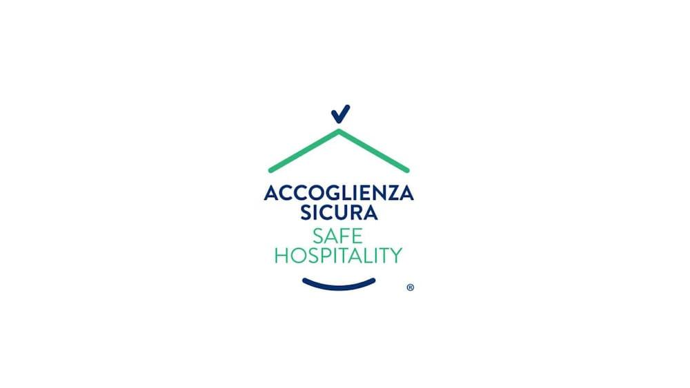 Toscana Charme Resort Tirrenia Eksteriør billede Safe Hospitality logo