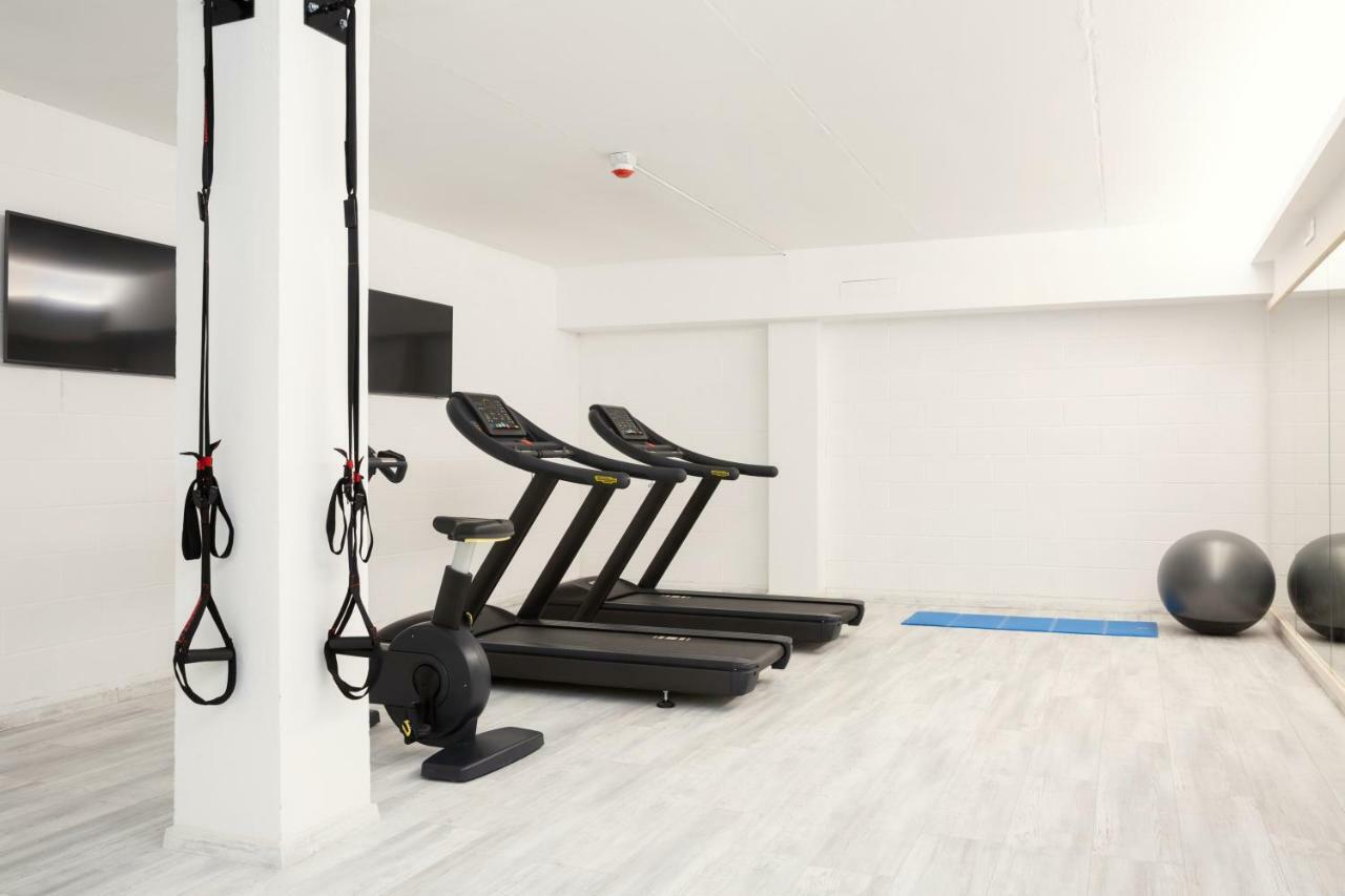 Toscana Charme Resort Tirrenia Eksteriør billede A Peloton bike in a gym